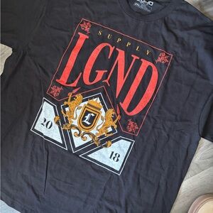 Black Graphic Tee with Red and Gold Accents